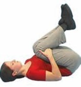 Lying on your back with your knees bent