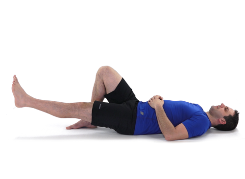 A man doing a straight leg raise