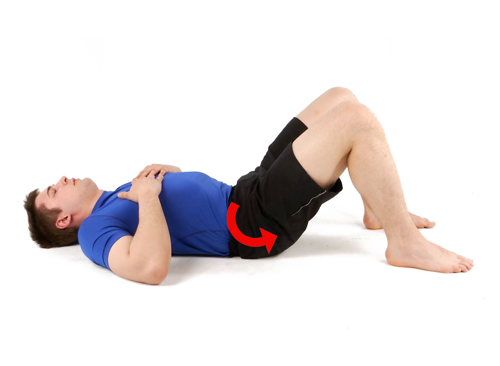 A man doing a pelvic tilt